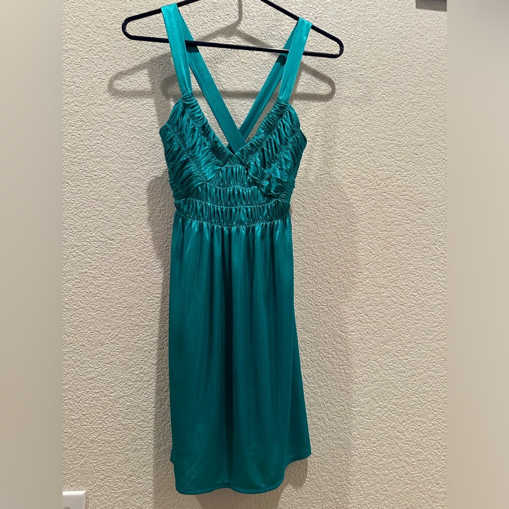 Turquoise satin mini dress.